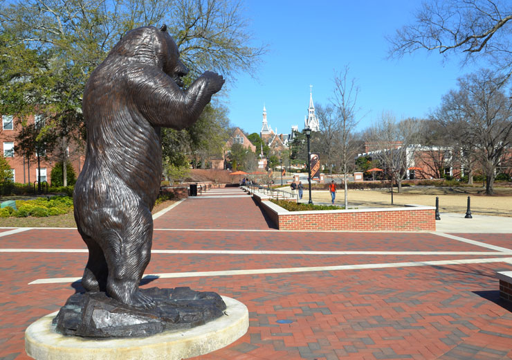 Bronze bear statue on campus